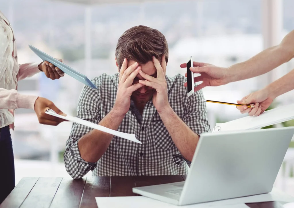 stressed men in an office