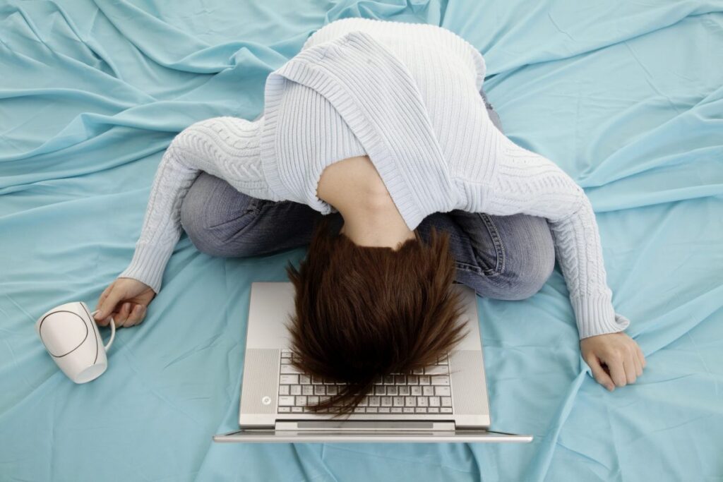 girl exhausting from studying